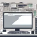 A stylized graphic of a desktop computer.